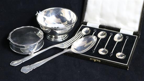 A George V silver trinket box and a sugar bowl, a cased set of silver coffee spoons and a spoon and fork.